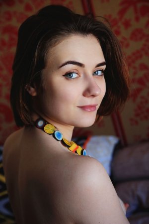 Long beads inside a clean shaved brunette pussy photo 1