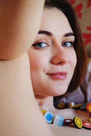 Long beads inside a clean shaved brunette pussy photo 12