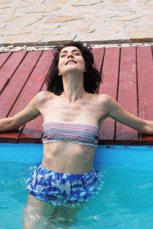 Hottie swims in outdoor pool in tiny outfit photo 7