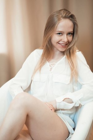 Cutie makes pictures of her shaved pussy photo 6