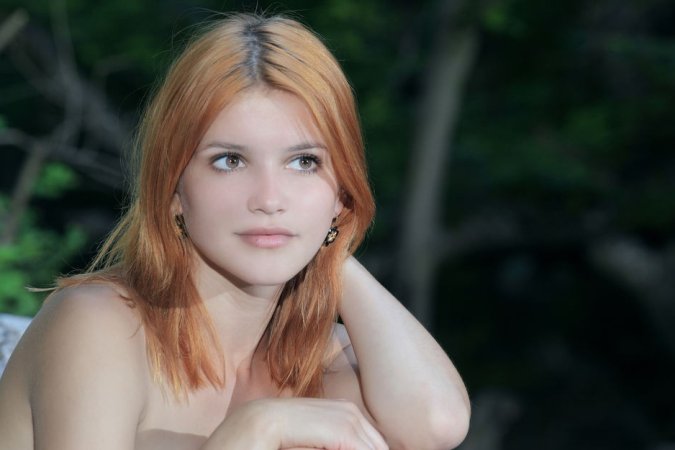 Ginger chick rubs pussy against the harsh stone photo 11