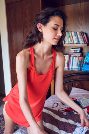 Sexy chick goes down on all fours on camera photo 16