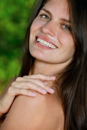 Dark-haired forest nymph gets orgasm under tree photo 14