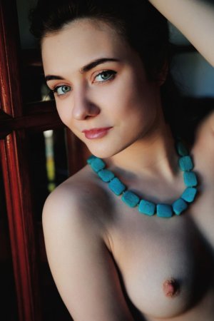 Brunette admires the beauty of her body photo 6