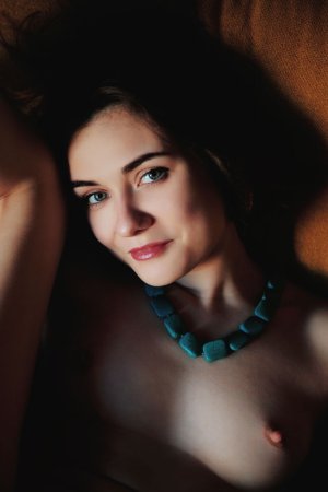 Brunette admires the beauty of her body photo 9