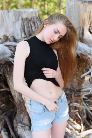Gentle sweetie poses naked in the local forest photo 15
