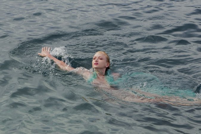 Naughty hottie swims naked in the sea photo 14