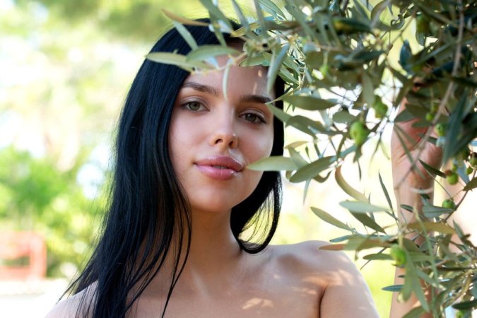 Naked chick poses naked in the forest photo 1