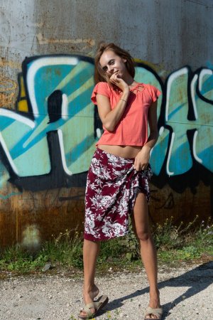 Naked babe poses at the water tower photo 6