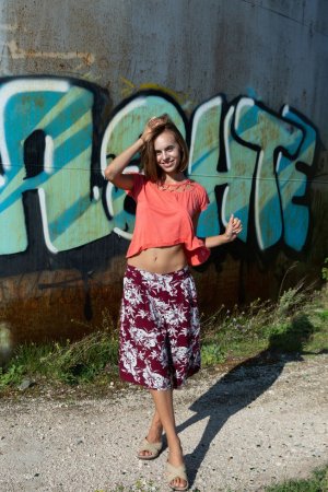 Naked babe poses at the water tower photo 18