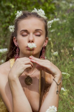 Sweetie plays naked in the field until she is satisfied photo 14