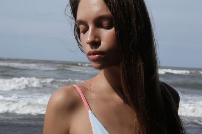 Hottie performs fantastic striptease in the sand photo 16