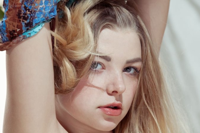 Bored sweetie goes down on all fours on camera photo 11