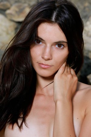 Perfect brunette relaxes naked on a hot summer day photo 8