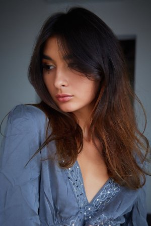 Naked brunette shows the beauty of her pussy photo 14