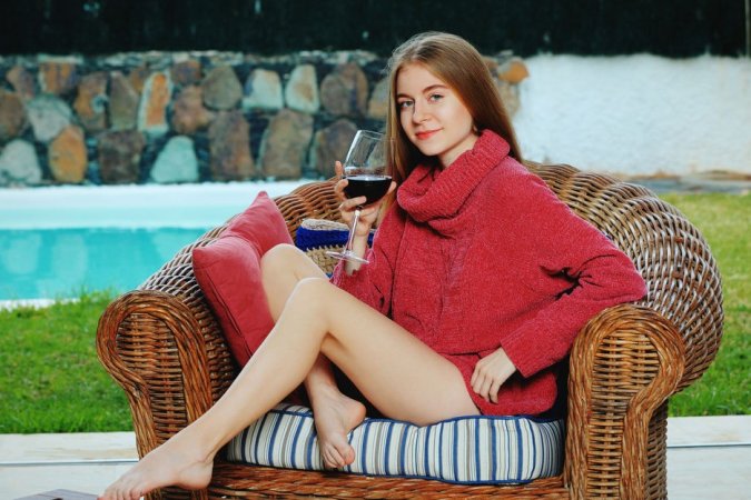Hottie in sweater orgasms at outdoor pool on cool day photo 3