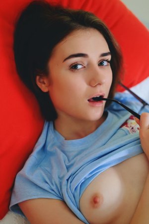 Naughty babe reads books and masturbates at once photo 7
