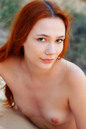 Janey teases with a glimpse over her shoulder photo 17