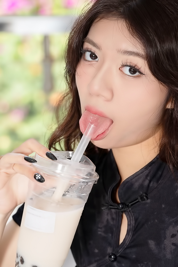 Tina Thao sips bubble tea, revealing her shaved pussy