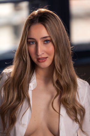 Lula Stocch stripping in bedroom scene photo 3