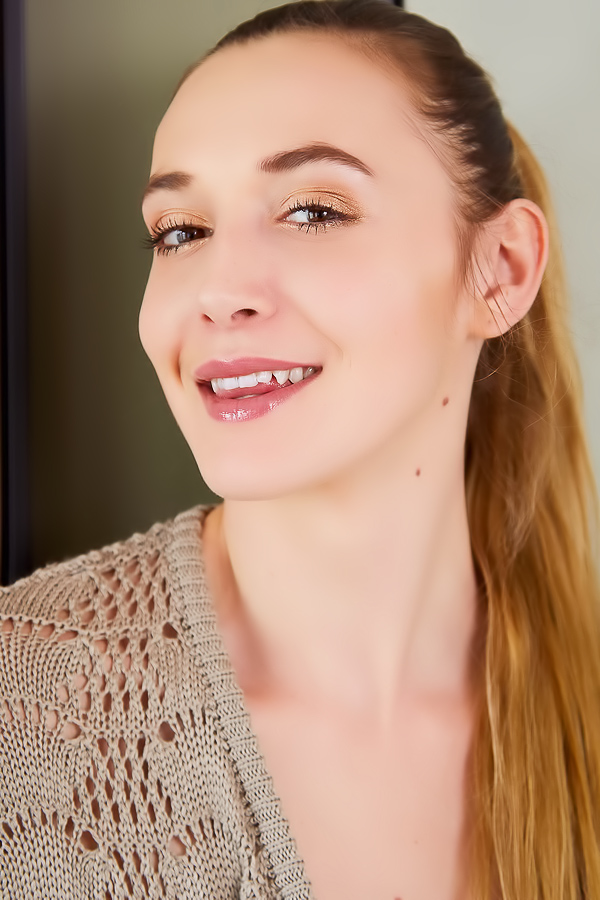 Victoria Benz inches off her sweater