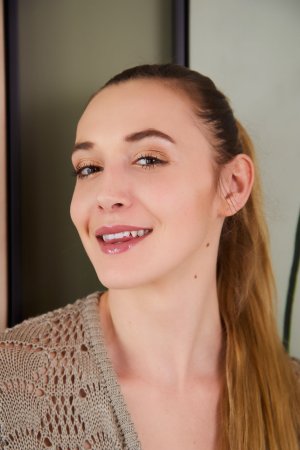 Victoria Benz inches off her sweater photo 2