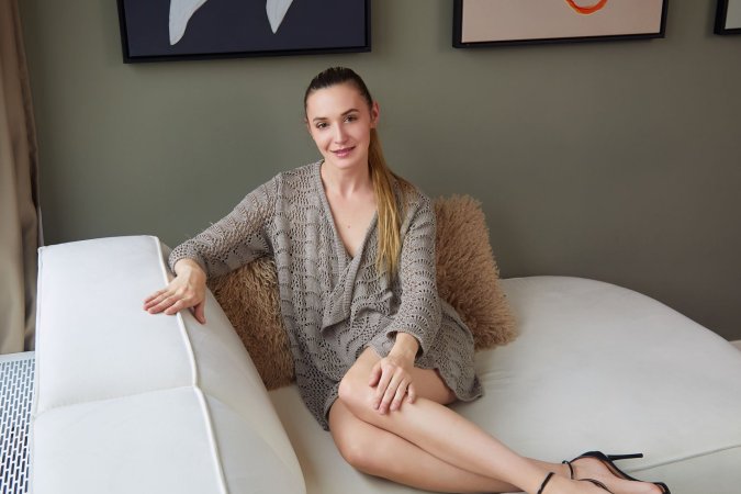 Victoria Benz inches off her sweater photo 6
