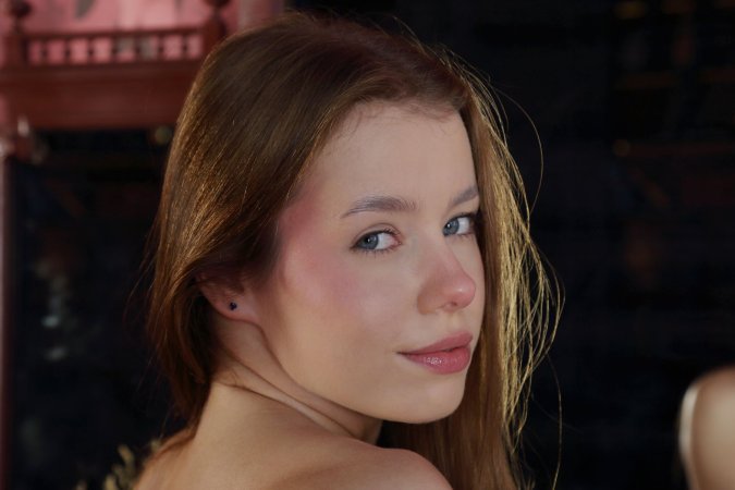 Lalli removes panties with her feet on a chair photo 18