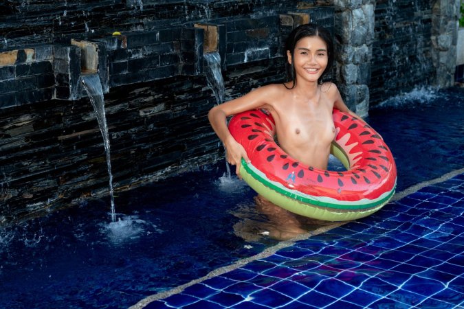 Vina Rae splashes with inflatable flamingo photo 18